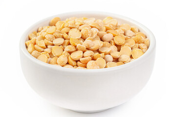 Raw dried uncooked pea beans with ceramic bowl on white background macro