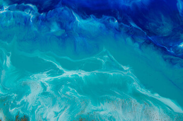 Epoxy resin art. Imitation of the sea. Sea foam. Modern trendy hobby. Macro photo