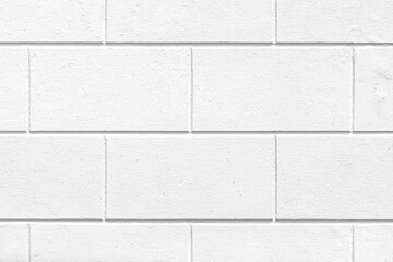 Building exterior white granite block wall texture and background seamless