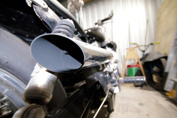 close up photo of a motorcycle exhaust
