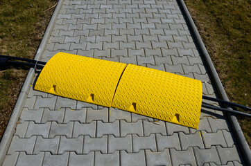 connecting electricity cables through walking paved sidewalk road. a safe way to protect your cable...