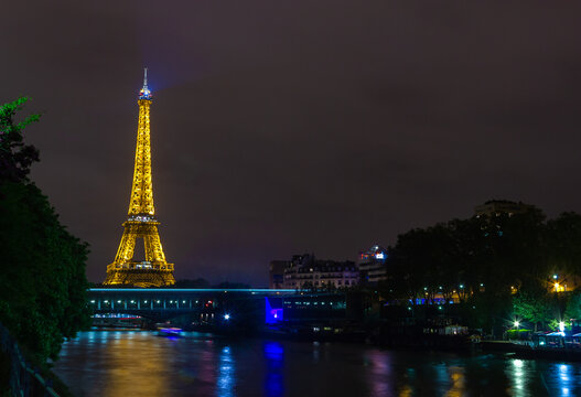 Paris, France - April 25, 2015: A picture of the illuminated Eiffel Tower at night.