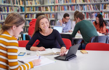 the student uses a notebook and a school library