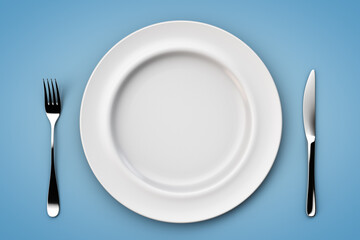Empty plate on the table. Dietetics topic. Top view.