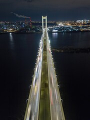 South automobile bridge in Kiev. Night illumination of the bridge. Aerial drone view.