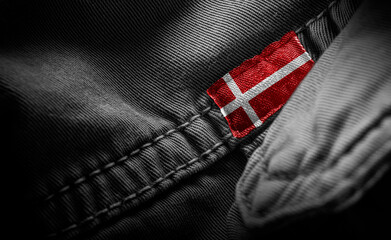 Tag on dark clothing in the form of the flag of the Denmark