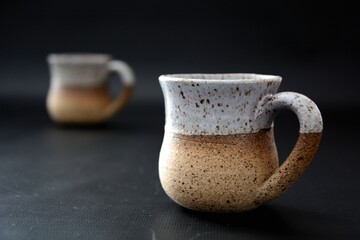 Clay mug in perspective.