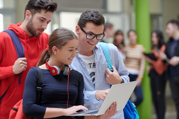 students using modern technology for school project