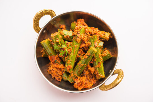 Moringa Drumstick vegetable gravy or dry recipe served in a bowl or plate, Indian food