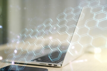 Creative abstract wireless technology hologram with hexagon on modern computer background, artificial intelligence and machine learning concept. Multi exposure