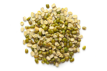 macro Close-up of Organic green Gram (Vigna radiata) or spilt green moong dal unpolished cleaned on a white background. Top view