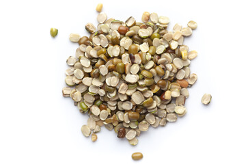 Macro Close-up of Organic split green urad dal (Vigna mungo) cleaned on a white background. Top view