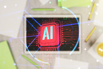 Double exposure of creative artificial Intelligence abbreviation and modern digital tablet on...