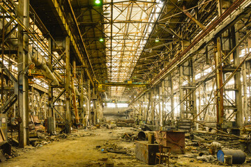 An old abandoned industrial workshop after metallurgical production . The concept of ruin, defeat, failure, failure .