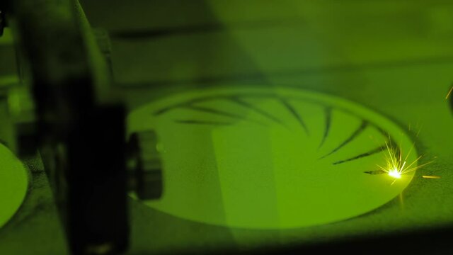 Selective laser melting - additive manufacturing metal 3D printer printing model - close up view. Prototyping, metalworking, engraving, futuristic, production and technology concept