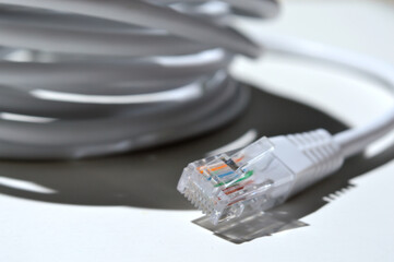 Twisted Lan wire with connector rj 45. close-up.