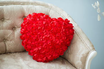 Beautiful big red heart made of paper, handmade, decoration in an interior photo studio