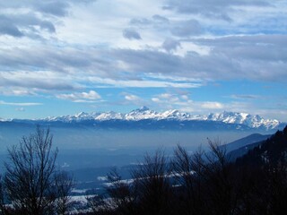 View of the peak of Triglav mountain in Julian alps, Gorenjska, Slovenia overed in snow