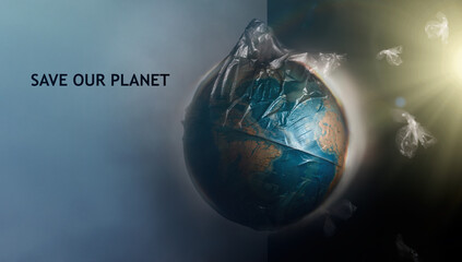 Globe of planet Earth dressed in a garbage plastic bag. The inscription SAVE OUR PLANET. The...