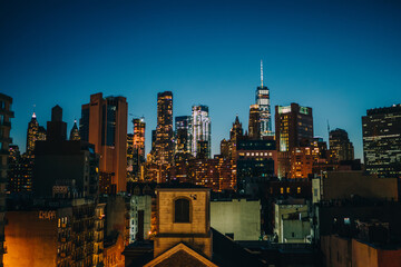 Illuminated skyscrapers in city center