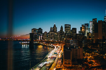 Evening skyline of Manhattan skyscrapers with Hudson river