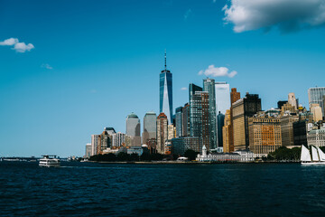 Fototapeta na wymiar Contemporary skyscrapers near river in New York City