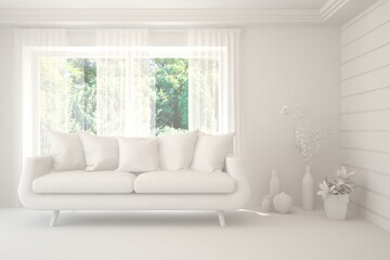 Fototapeta premium Mock up of stylish room in white color with sofa and green landscape in window. Scandinavian interior design. 3D illustration