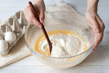 Female hands kneading muffin dough, homemade baking recipe