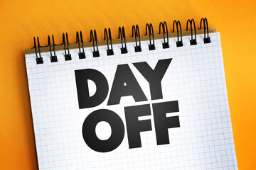 Day Off text quote on notepad, concept background