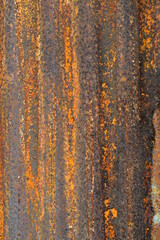 Rusted metal siding, old iron sheet coated with anti-rust and corrosion paint. Texture or background For inserting background articles