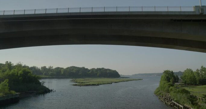 Bridge over the river and greenery on either sides