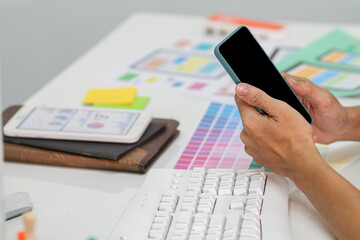 Smooth Focus,A team of UI UX web designers are working together to develop a mobile responsive website with UI UX Front End Designer Previewing. Website development concept UI UX front end designer
