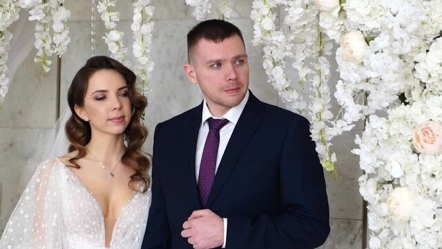 bride and weeping groom at official registration of marriage