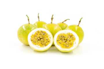 Closeup of many fresh golden passion fruit isolated on white background