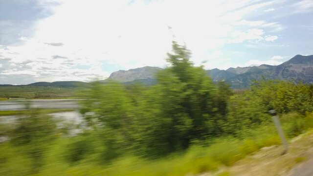 WATERTON, AB, CANADA - JULY 2019: Smooth & cinematic gimbal driving views of Waterton National Park