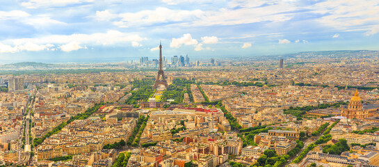Panorama of Tour Eiffel and national residence of the Invalids from Observatory Deck of Tour Montparnasse. Aerial view of Paris skyline and cityscape. Top of Tour Montparnasse tower of Paris, France