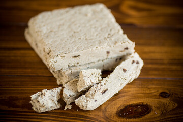 piece of sweet halva on a wooden table