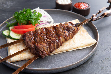 Platter of kebabs. Uch-panzha of lamb