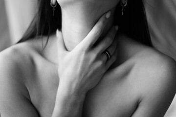 Close up view neck of young woman.