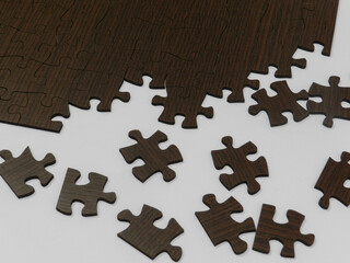 Wooden puzzle being assembled on white table