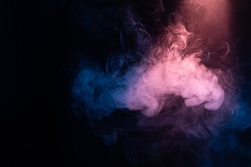 Blue and pink steam on a black background.