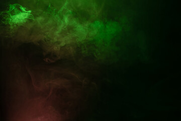 Green and pink steam on a black background.