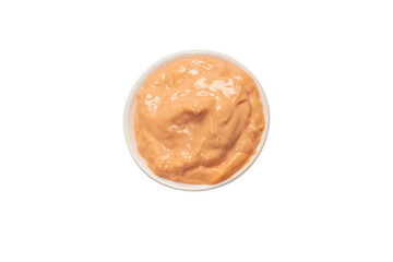 Sauce in a bowl isolated on white.