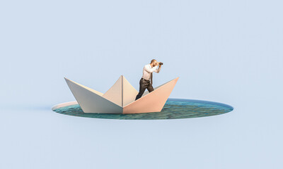 man with binoculars on a paper boat