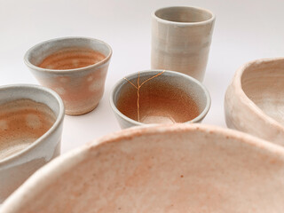 Kintsugi, Japanese broken pottery restored with gold, the beauty of being different and unique