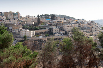 Fototapeta na wymiar Arabian village on the hillside of Mount of Olives in Jerusalem, Israel.