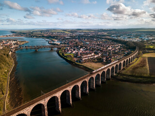 Aerial view of stone arches of the railway viaduct crossing River Tweed, Berwick-upon-Tweed,...