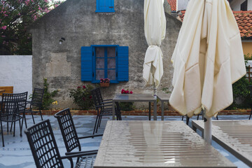 empty restaurant after summer thunderstorm in Nin historical centre, Dalmatia, Croatia