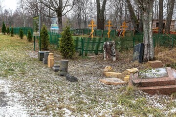 Russia, Leningrad region, December 2020. Tombstones in the old cemetery.