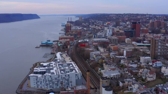 Aerial forward over Yonkers city near Hudson river, New York